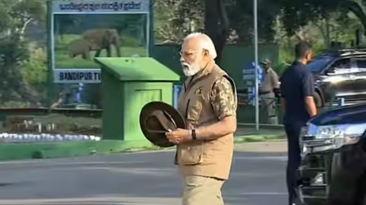 PM Narendra Modi wear sporting a camouflage cloth with hat for Bandipur Tiger Reserve safari 