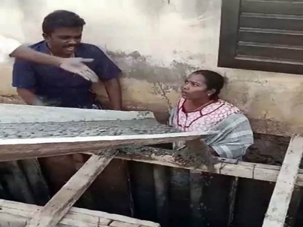 karur: a contractor poured concrete mixture on a protesting husband and wife who descended into a sewage drainage 