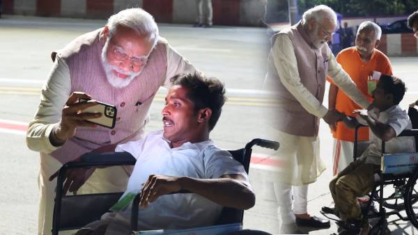 pm-modi-take-selfie-with-differently-abled-bjp-member-from-erode