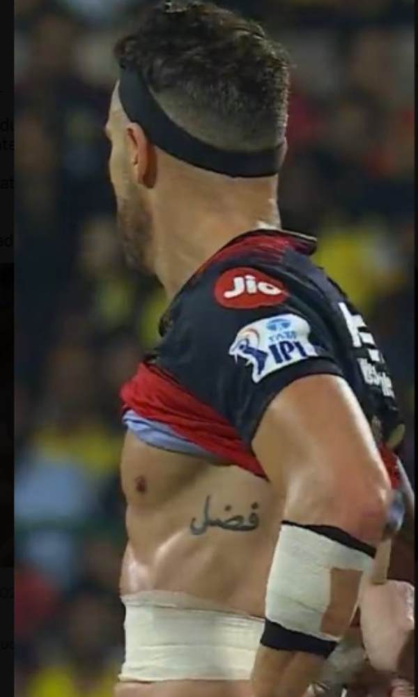 RCB skipper DU Plesis bare body pics gets attention: What is the meaning of his arabic tattoo? RCB skipper DU Plesis bare body pics gets attention: What is the meaning of his arabic tattoo?