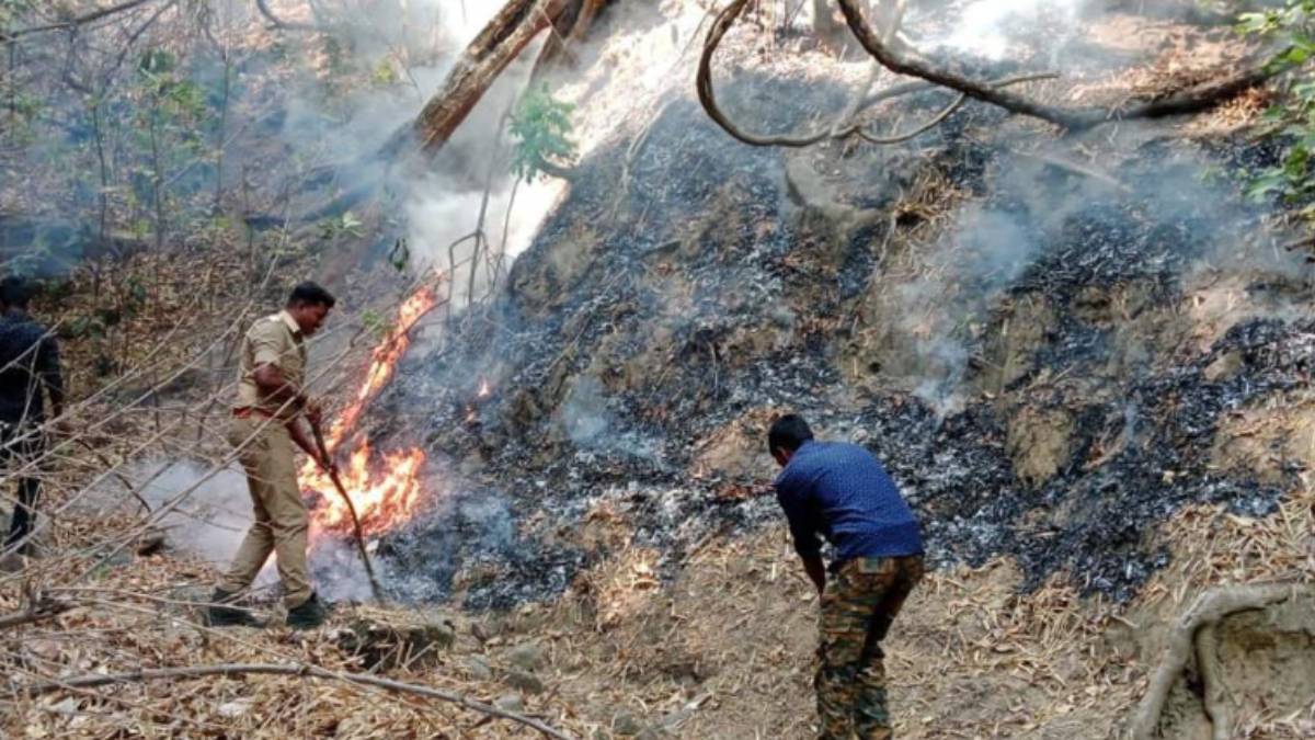 Helicopter using to doused Western Ghats Forest fire near by Madhukkarai in Coimbatore 