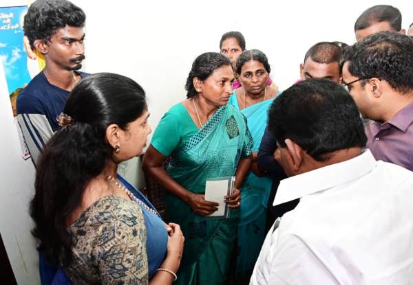 Kanimozhi MP presented a compensation cheque of Rs 1 crore given by the Tamil Government to the family of VAO Lourde Francis 