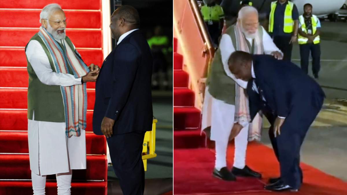 Papua New Guinea PM Touches PM Modis Feet as he visit the nation for the first time Papua New Guinea PM Touches PM Modis Feet as he visit the nation for the first time