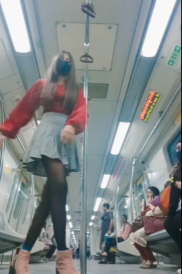 Woman In Mini-Skirt Dances To Punjabi Song in Delhi Metro after Bikini Delhi Metro Girl Woman In Mini-Skirt Dances To Punjabi Song in Delhi Metro after Bikini Delhi Metro Girl