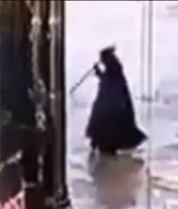 Who is this ghost like figure man and grim reaper at king charles coronation video Who is this ghost like figure man and grim reaper at king charles coronation video