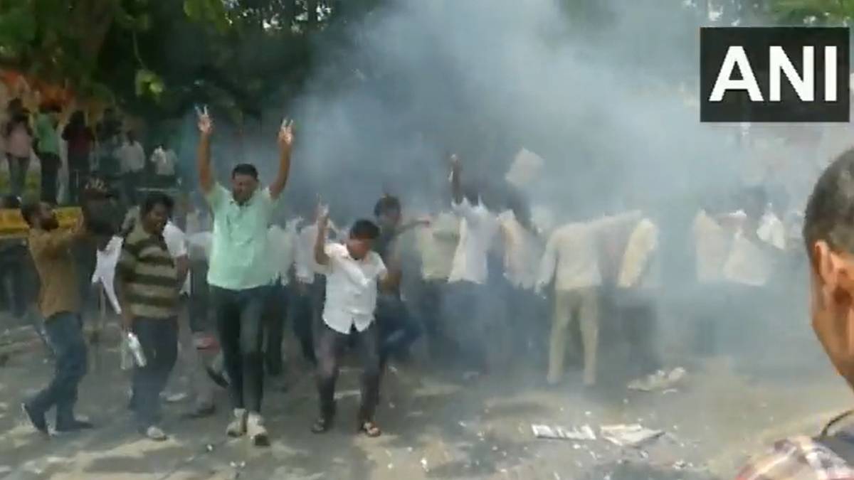 Supporters celebrate by bursting firecrackers as news emerges that Siddaramaiahs name has been nominated as the CM of Karnataka 