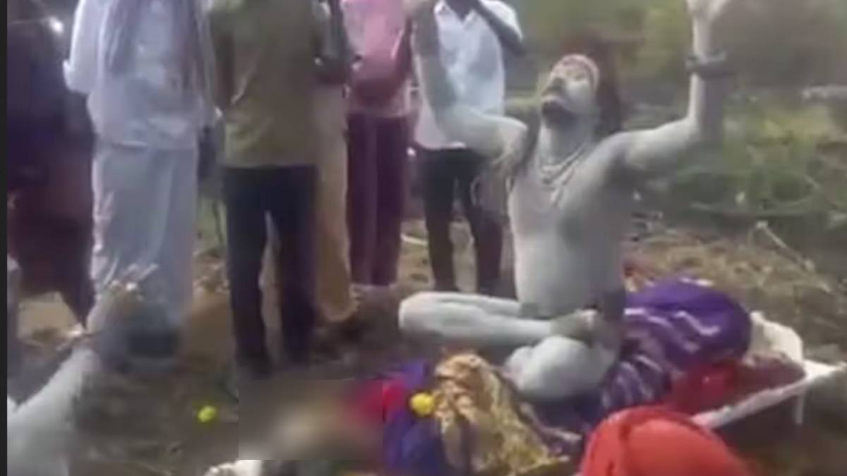 Agori Manikandan sits on the dead body in cemetry and did pooja 
