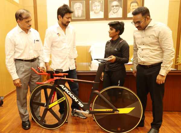  Minister Udhayanidhi Stalin Gifts Rs 14 Lakh Racing Bicycle to Cyclist Tabitha 