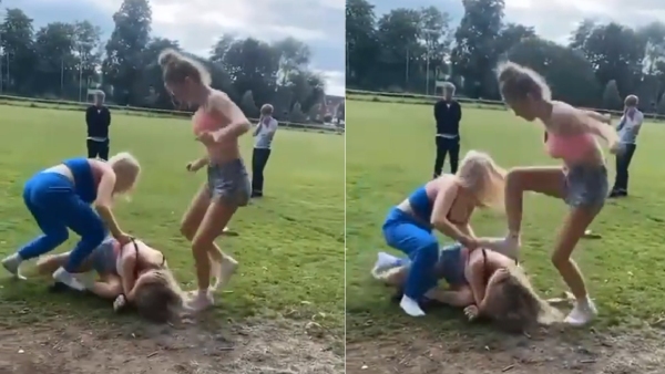 Are these two women attacking and kicking the teen young girl in park