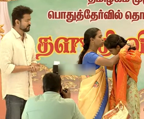 Vijay gifted a diamond necklace to Nandini who scored 600 out of 600 Vijay gifted a diamond necklace to Nandini who scored 600 out of 600
