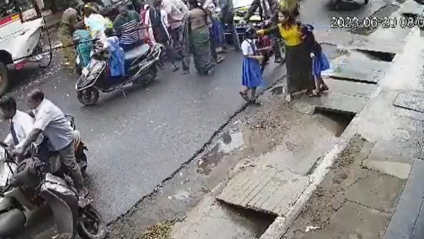  A woman hugs the girl children who met with an accident in Pondicherry 