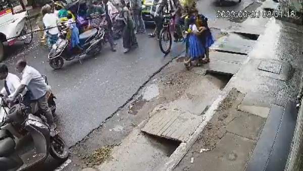  A woman hugs the girl children who met with an accident in Pondicherry 