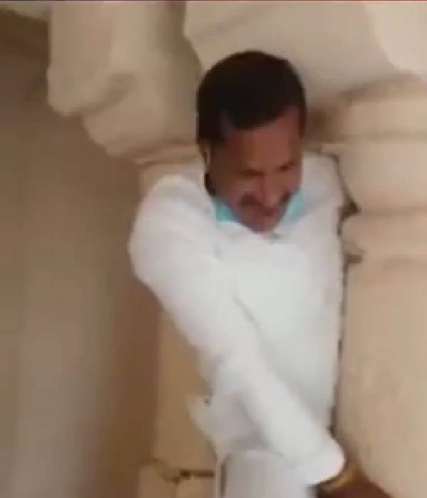 Video of BJP MLA Dilip Makwana Seen Stuck Between Two Pillars is shared by many Video of BJP MLA Dilip Makwana Seen Stuck Between Two Pillars is shared by many