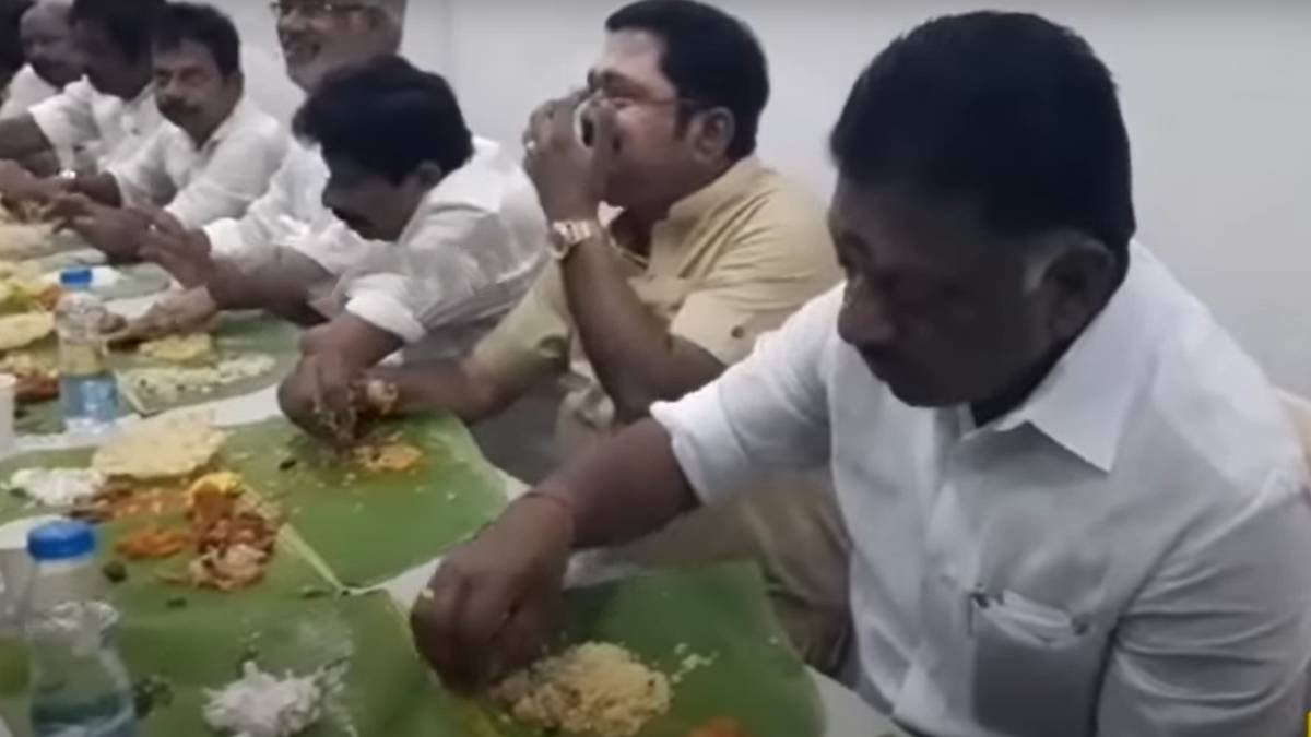 Ex Minister Vaithilingam home function, OPS folded a banana leaf in half for TTV Dinakaran 