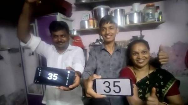 A 10th-grade student who just passed, celebrated enthusiastically in maharashtra 