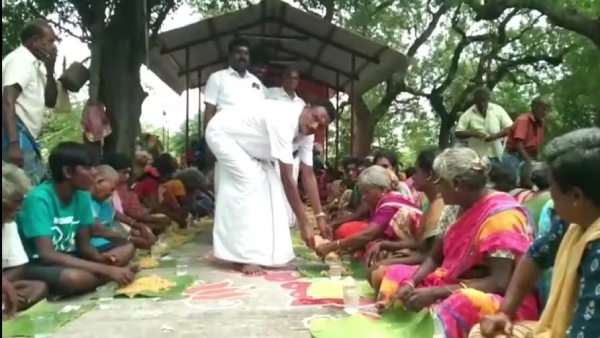 A village president had a biryani feast for villagers who had worked on the 100-day work scheme 