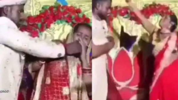 Did the bride give a kiss to the guests and mother in law blows cigarette smoke on her face 