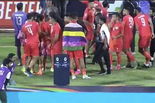 Indian footballer Jeakson Singh from Manipur draped in Meitei flag at SAFF medal event, controversy Indian footballer Jeakson Singh from Manipur draped in Meitei flag at SAFF medal event, controversy