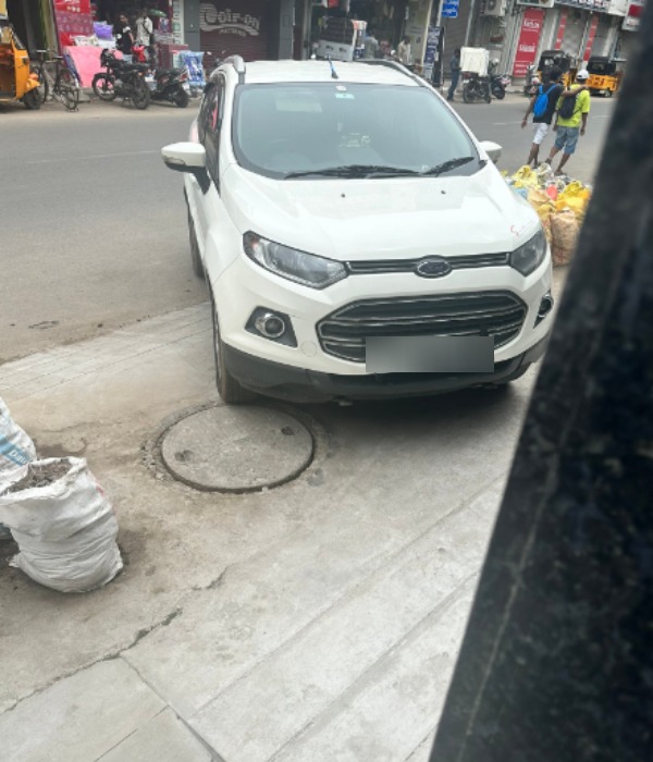 Fine for parking in front of neighbors house in Chennai