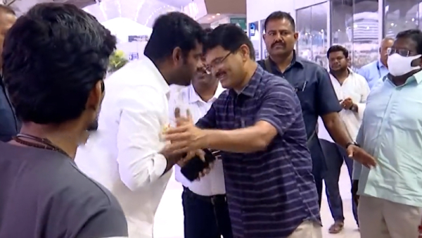 Tamilnadu BJP chief Annamalai touches the feet of his teacher in Chennai airport Tamilnadu BJP chief Annamalai touches the feet of his teacher in Chennai airport