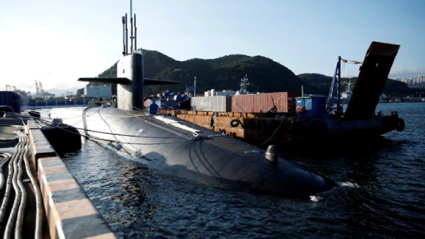 US nuclear-armed submarine has arrived in South Korea while Russian and Chinese officials have arrived in North Korea 