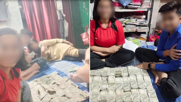 Police officer faces probe after his wife and children show off bundle of money on social media 