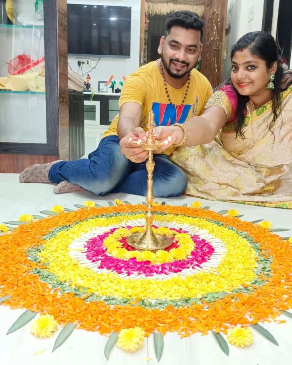 Onam Festival celebration news reader family with Onam sadhya 