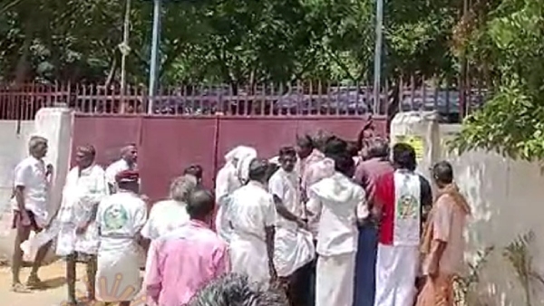 AIADMK members who came for the Madurai meeting waiting outside a private bar to drink 