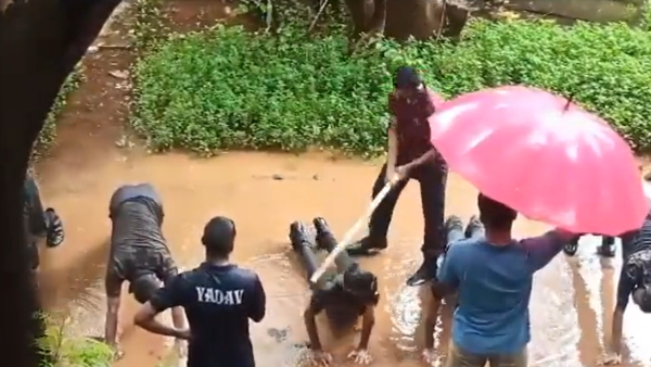  NCC training shocking video Senior brutally beats juniors with big pipe in rain