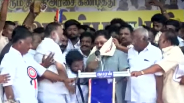  OPS brother O Raja touches the feet of TTV Dhinakaran on Kodanadu protest