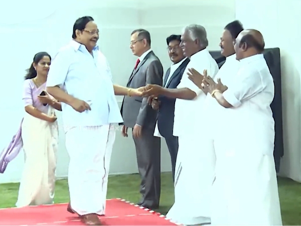  AIADMK former ministers laughing and talking with DMK ministers at raj bhavan today