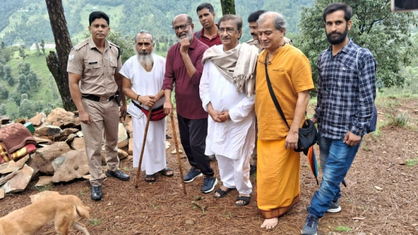  What did Rajini says to tamil man who walked to Babaji Cave? 