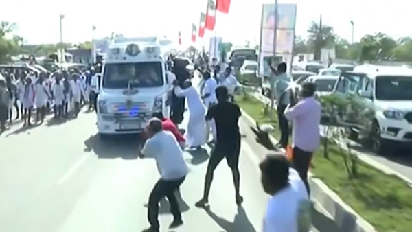 AIADMK cadres fall before the van in which Edappadi Palanisamy travelling AIADMK cadres fall before the van in which Edappadi Palanisamy travelling