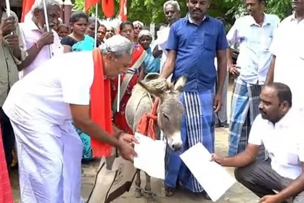 Free House Plot Patta and Struggle to petition the donkey in Kovilpatti Taluk Office