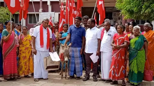 Free House Plot Patta and Struggle to petition the donkey in Kovilpatti Taluk Office