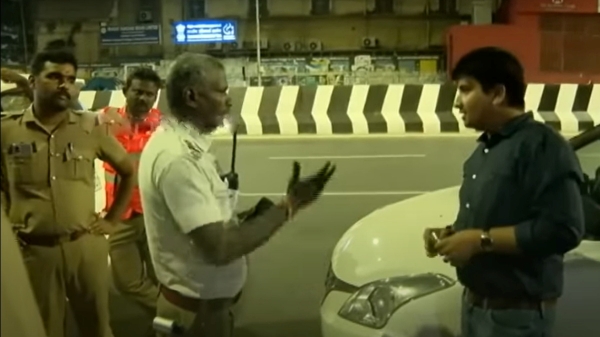 Drunk man who driving a car exchanged a heated argument with traffic in chennai police 