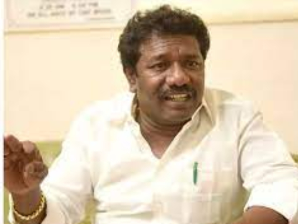 Actor karunas talks about Actor cum Director Marimuthu 