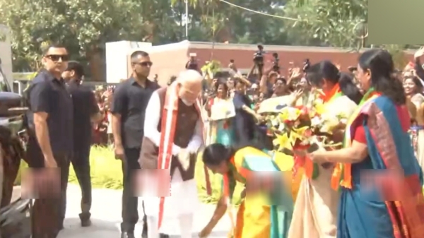 PM Modi got angry as BJP MLA Vanathi Srinivasan touched his feet on 33% reservation row PM Modi got angry as BJP MLA Vanathi Srinivasan touched his feet on 33% reservation row