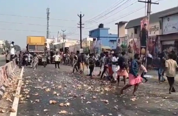 Vijay fans broke hundred of coconuts on road made traffic jam Vijay fans broke hundred of coconuts on road made traffic jam