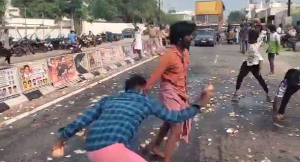 Vijay fans broke hundred of coconuts on road made traffic jam Vijay fans broke hundred of coconuts on road made traffic jam