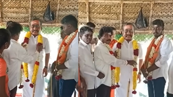 whose is the statue next to the statue of actor Marimuthu 