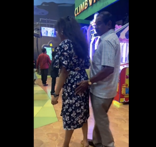  A video of an elderly man behaving indecently with a woman at lulu mall in bangalore 