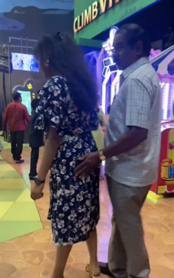  A video of an elderly man behaving indecently with a woman at lulu mall in bangalore 