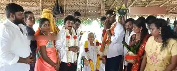 whose is the statue next to the statue of actor Marimuthu 