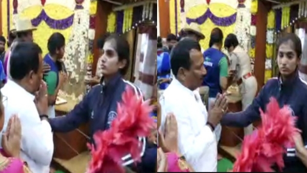 Woman police stopped the minister from entering Hasanamba temple which is open only Diwali Woman police stopped the minister from entering Hasanamba temple which is open only Diwali