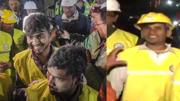 Rescued workers hugged and give almonds to rat hole miners who saved them Rescued workers hugged and give almonds to rat hole miners who saved them