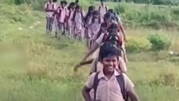  TN government has arranged a free auto facility for the Irula children living in Gandhigram to go to school and study