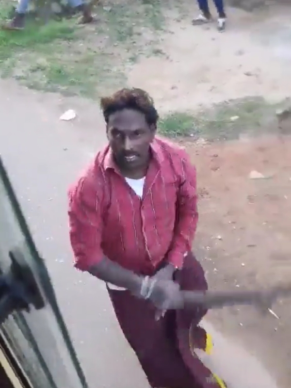 Man arrested who smashing the windows of government bus Man arrested who smashing the windows of government bus