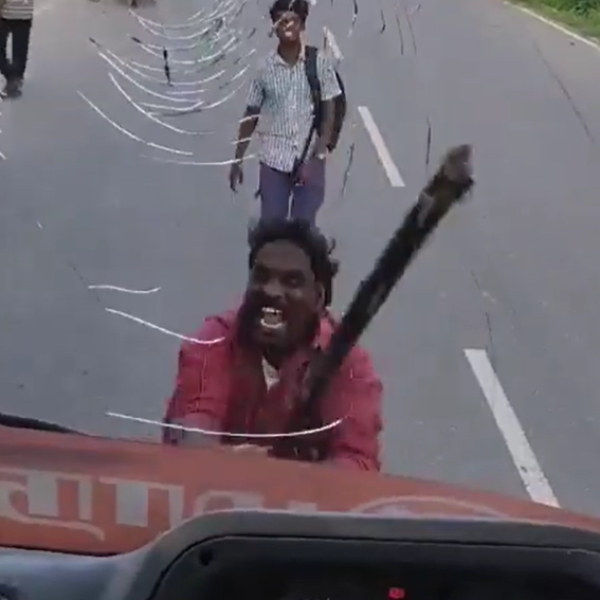 Man arrested who smashing the windows of government bus Man arrested who smashing the windows of government bus