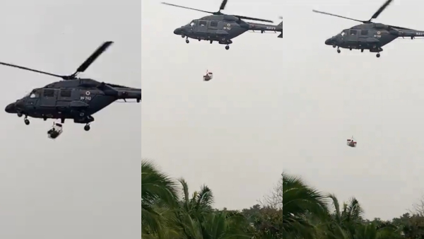 The Indian Navy is using a helicopter to rescue people trapped in floods in Tirunelveli 